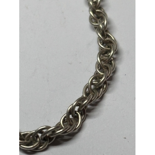 693 - A MARKED SILVER NECKLACE LENGTH 24