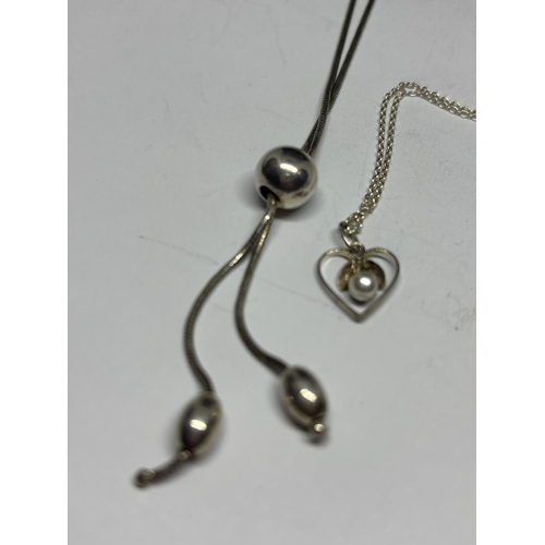 696 - FOUR MARKED SILVER NECKLACES WITH PENDANTS