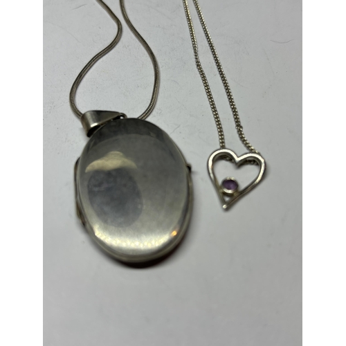 696 - FOUR MARKED SILVER NECKLACES WITH PENDANTS