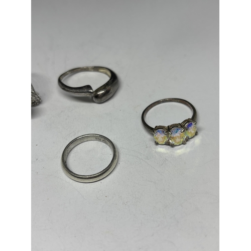 697 - FIVE MARKED SILVER RINGS