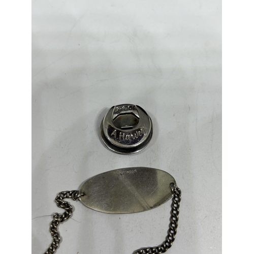 713 - FOUR MARKED SILVER ITEMS TO INCLUDE A CAMEO, COIN PIN, BADGE AND BRACELET