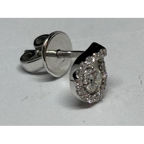 773 - A PAIR OF 18 CARAT WHITE GOLD EARRINGS STUDDED WITH ROUND BRILLIANT CUT NATURAL DIAMONDS 0.30 CARATS... 