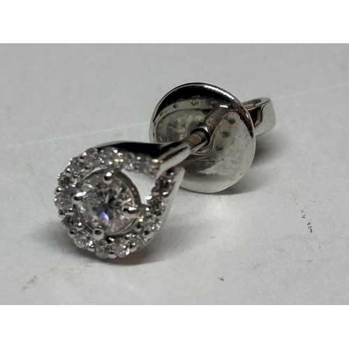 773 - A PAIR OF 18 CARAT WHITE GOLD EARRINGS STUDDED WITH ROUND BRILLIANT CUT NATURAL DIAMONDS 0.30 CARATS... 