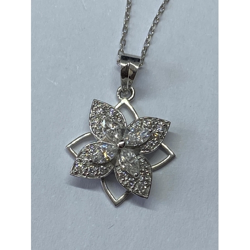 774 - AN 18 CARAT WHITE GOLD PENDANT WITH CHAIN STUDDED WITH MARQUISE AND ROUND BRILLIANT CUT NATURAL DIAM... 