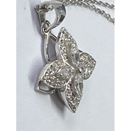 774 - AN 18 CARAT WHITE GOLD PENDANT WITH CHAIN STUDDED WITH MARQUISE AND ROUND BRILLIANT CUT NATURAL DIAM... 