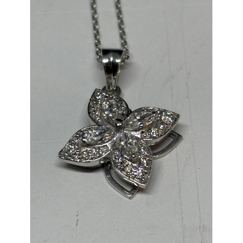 774 - AN 18 CARAT WHITE GOLD PENDANT WITH CHAIN STUDDED WITH MARQUISE AND ROUND BRILLIANT CUT NATURAL DIAM... 