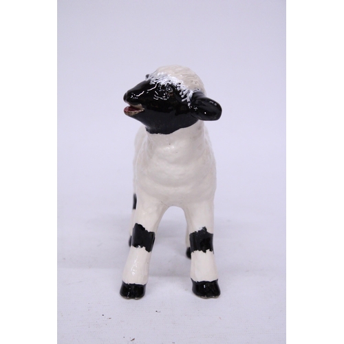 801 - AN ANITA HARRIS BLACK AND WHITE LAMB SIGNED IN GOLD