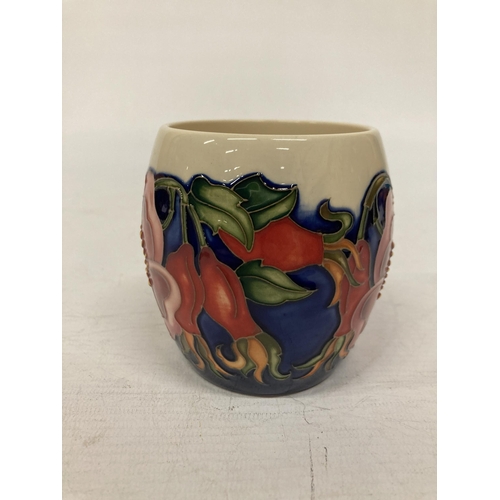 816 - A MOORCROFT MUG WILD ROSE PATTERN