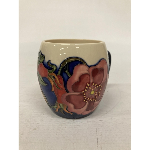 816 - A MOORCROFT MUG WILD ROSE PATTERN