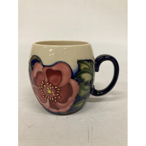 816 - A MOORCROFT MUG WILD ROSE PATTERN