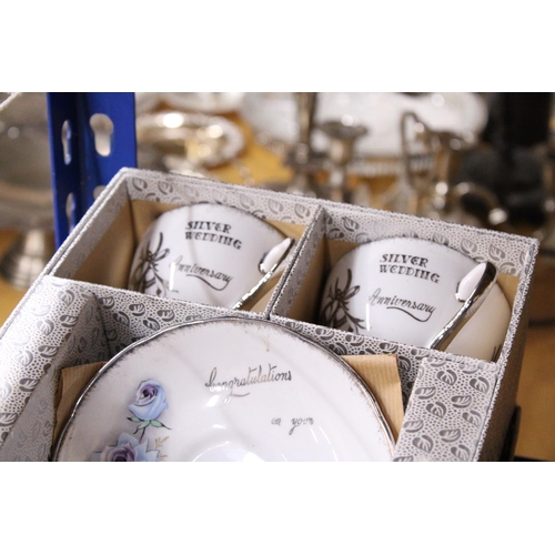 933 - TWO VINTAGE BOXED SILVER WEDDING CERAMIC CUPS AND SAUCERS