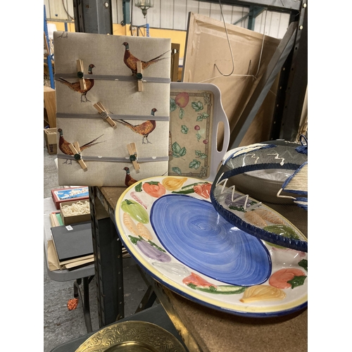 1050 - A QUANTITY OF LARGE SERVING BOWLS, A SERVING PLATE TRAYS, FLY COVER, ETC