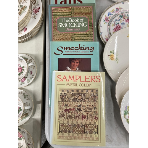 1059 - A QUANTITY OF CRAFTING BOOKS TO INCLUDE SAMPLERS, SMOCKING, GLOVES, FANS, ETC