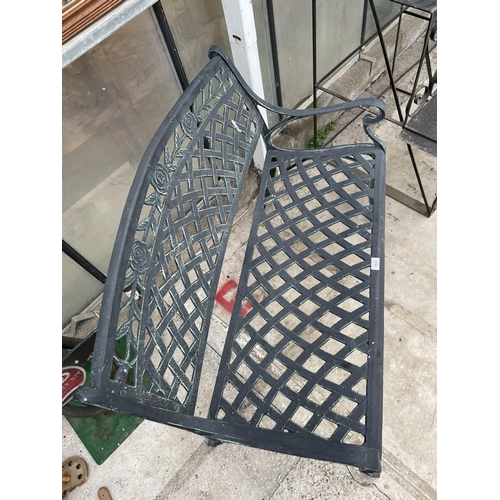 1533 - A DECORATIVE METAL TWO SEATER GARDEN BENCH