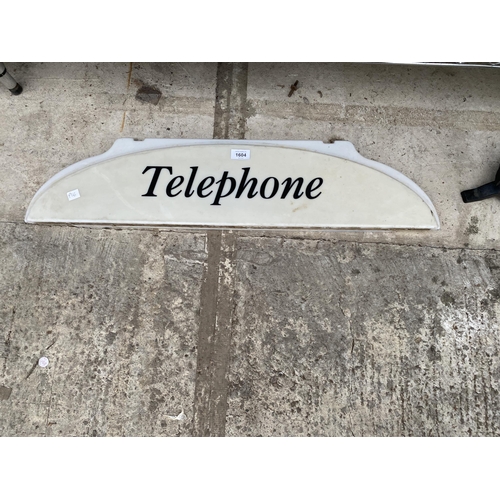 1604 - A PLASTIC TELEPHONE SIGN