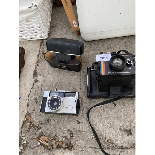 2050 - A SUPER COLOUR POLAROID CAMERA AND A HALINA CAMERA