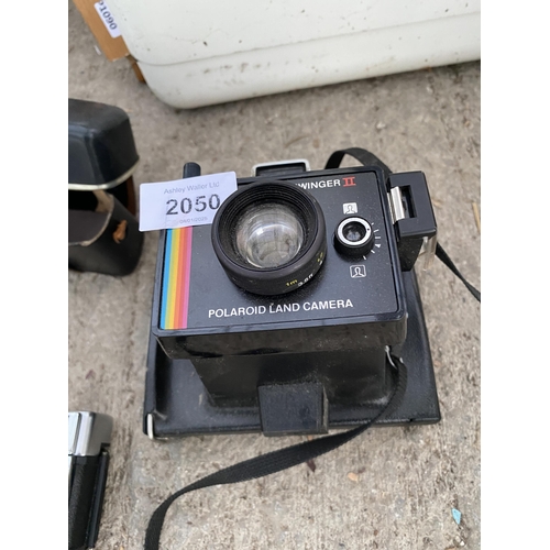 2050 - A SUPER COLOUR POLAROID CAMERA AND A HALINA CAMERA