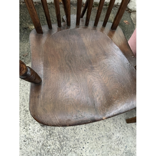 3098 - A WINDSOR STYLE CARVER CHAIR AND FIRESIDE CHAIR.