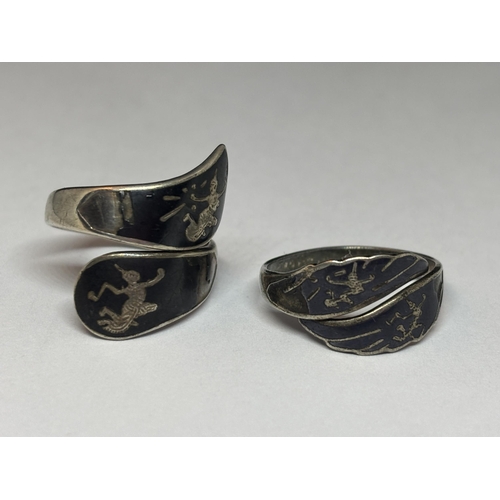 521 - THREE ASIAN SILVER ITEMS TO INCLUDE TWO RINGS AND A BRACELET