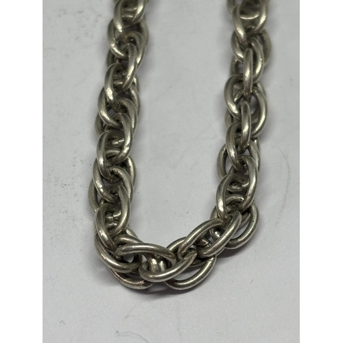 591 - A SILVER ROPE NECKLACE AND BRACELET