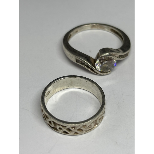 592 - SIX VARIOUS SILVER RINGS