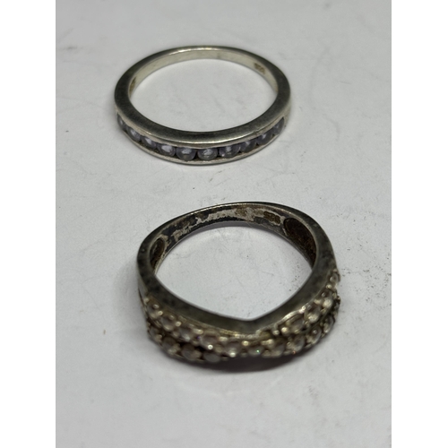 592 - SIX VARIOUS SILVER RINGS