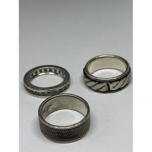 611 - SIX VARIOUS SILVER RINGS