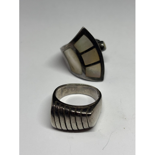 614 - SIX VARIOUS SILVER RINGS