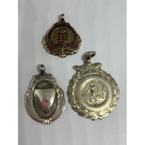 618 - FIVE HALLMARKED SILVER AND GOLD FOOTBALL FOBS