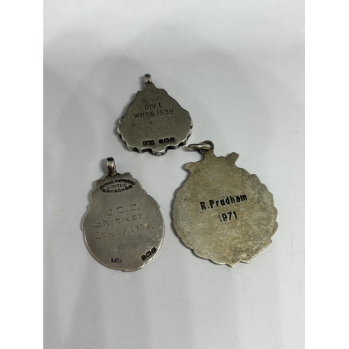 618 - FIVE HALLMARKED SILVER AND GOLD FOOTBALL FOBS