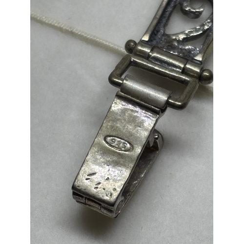 649 - A MARKED SILVER AND MOTHER OF PEARL WATCH IN A PRESENTATION BOX