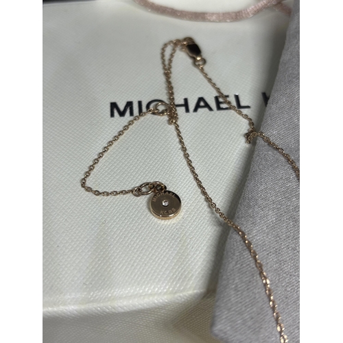 660 - A MICHAEL KORS DOUBLE STRAND CLEARSTONE NECKLACE WITH BOX AND POUCH