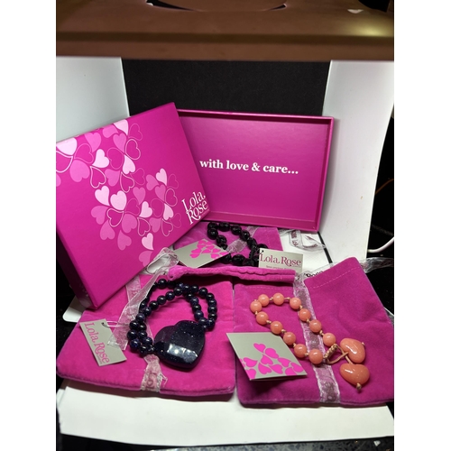 661 - THREE LOLA ROSE BRACELETS IN POUCHES WITH ORIGINAL PRESENTATION BOX