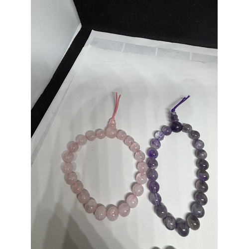 663 - FOUR SEMI PRECIOUS STONE BRACELETS