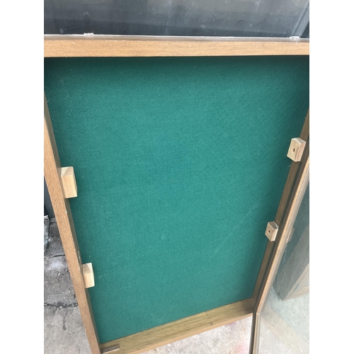 1504 - A TEAK FRAMED GLASS FRONTED WALL DISPLAY CASE WITH KEY