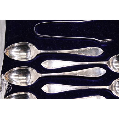 105 - A BOXED SET OF 12 HALLMARKED SHEFFIELD SPOONS AND SUGAR TONGS, TOTAL WEIGHT 191g