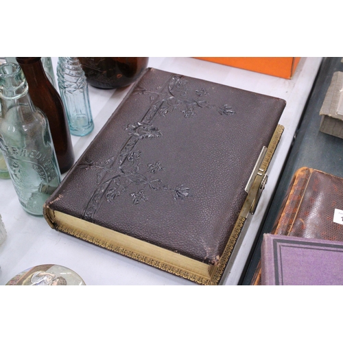 109 - AN ANTIQUE CIRCA 1800 LEATHER PHOTO ALBUM WITH SIGNED FLORAL WATERCOLOUR ARTWORK TO THE INNER