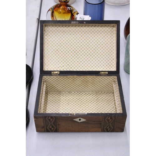 113 - A WALNUT INLAID  DOMED WORK BOX WITH GEOMETRIC MARQUETRY TOGETHER WITH AN ANTIQUE OAK AND BRASS VICT... 