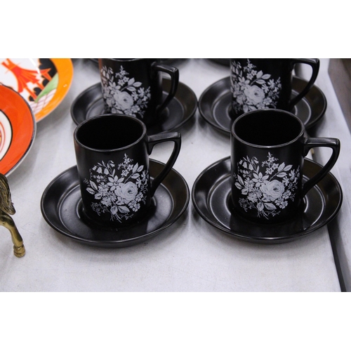 114 - A PORTMERION BLACK WITH FLORAL BOUQUET COFFEE SET