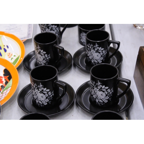 114 - A PORTMERION BLACK WITH FLORAL BOUQUET COFFEE SET