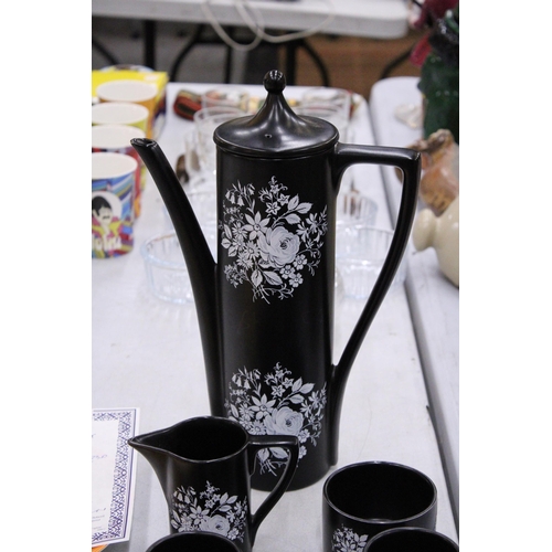 114 - A PORTMERION BLACK WITH FLORAL BOUQUET COFFEE SET