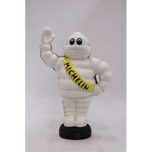 122 - A CAST IRON MICHELIN MAN MONEY BOX