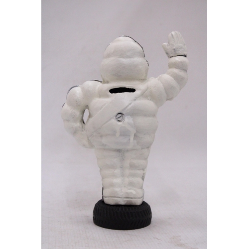 122 - A CAST IRON MICHELIN MAN MONEY BOX