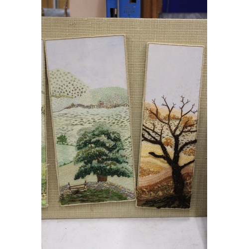 14 - FOUR HAND EMBROIDERED PANELS OF TREES AND THE COUNTRYSIDE