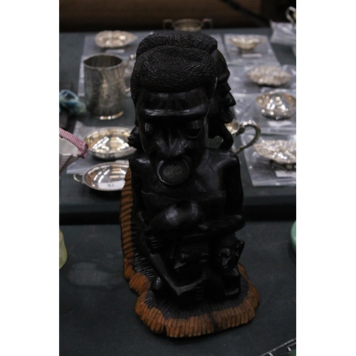 159 - A CARVED HARDWOOD AFRICAN SCULPTURE OF A FAMILY GROUP