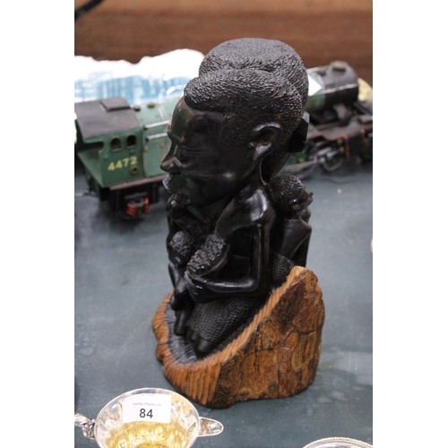 159 - A CARVED HARDWOOD AFRICAN SCULPTURE OF A FAMILY GROUP