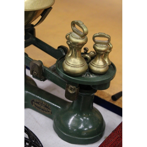 24 - A SET OF VINTAGE CAST 'FREDERICK HILL AND CO. TRUSTWORTHY' SCALES WITH BELL WEIGHTS PLUS TWO TRIVETS