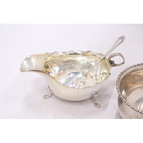 25 - THREE PIECES OF HALLMARKED SILVER TO INCLUDE A BIRMINGHAM SUGAR BOWL, A CHESTER CREAM JUG AND A BIRM... 