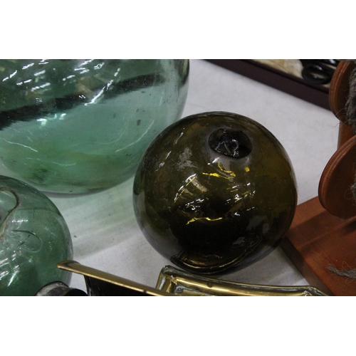 37 - TWO SMALL AND ONE LARGE VINTAGE GLASS FLOATS/BUOYS