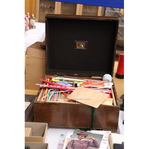 42 - A VINTAGE HMV GRAMOPHONE BOX CONTAINING A LARGE QUANTITY OF KNITTING NEEDLES, VINTAGE KNITTING PATTE... 